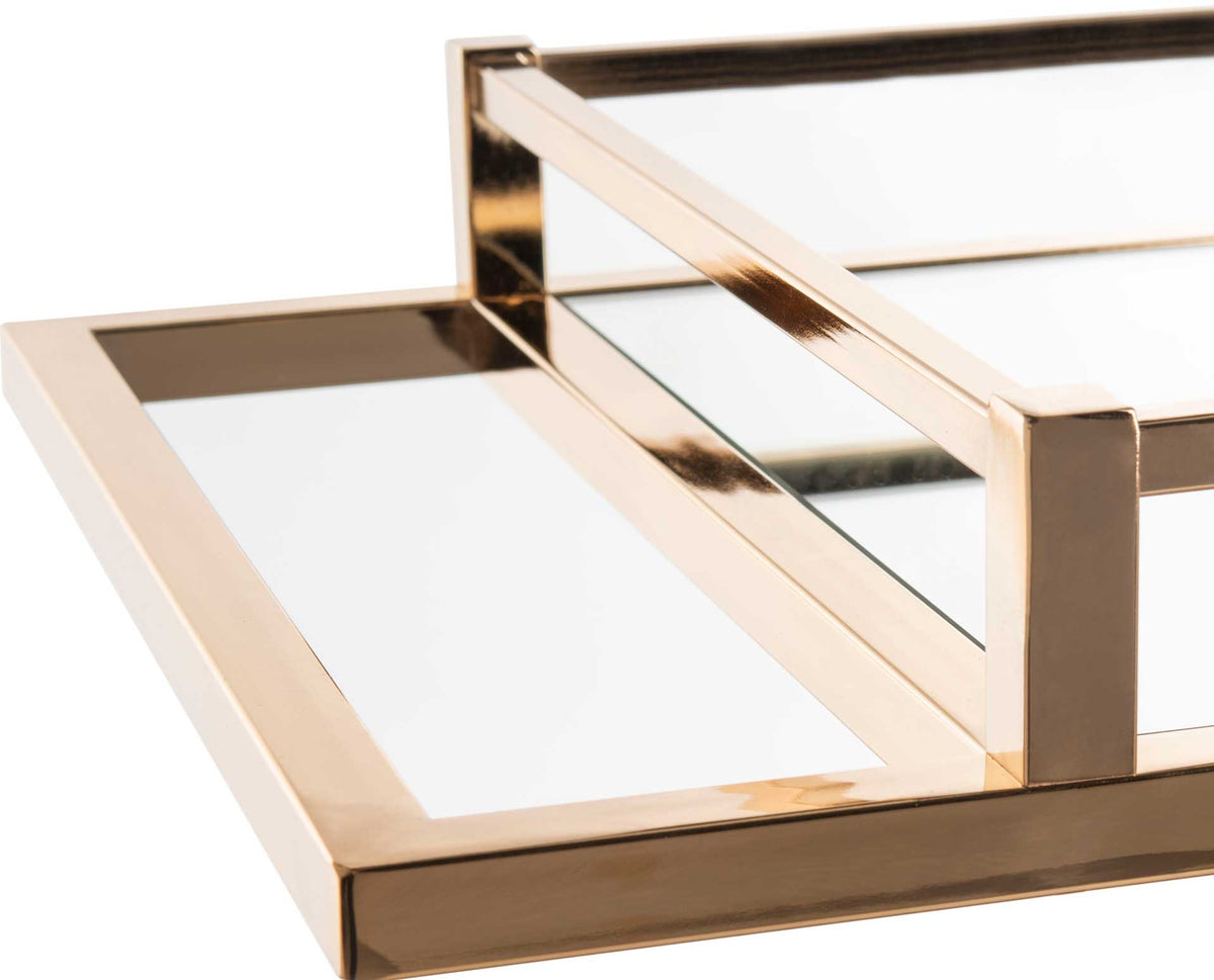 Polished gold rails frame the mirrored serving tray with crisp, modern lines