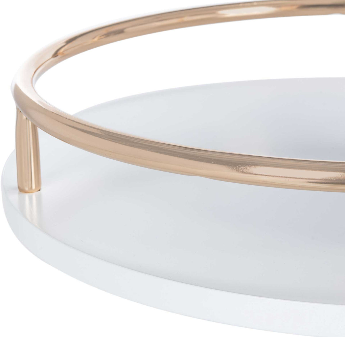 A gleaming gold-tone guardrail outlines the swiveling white serving shelf.