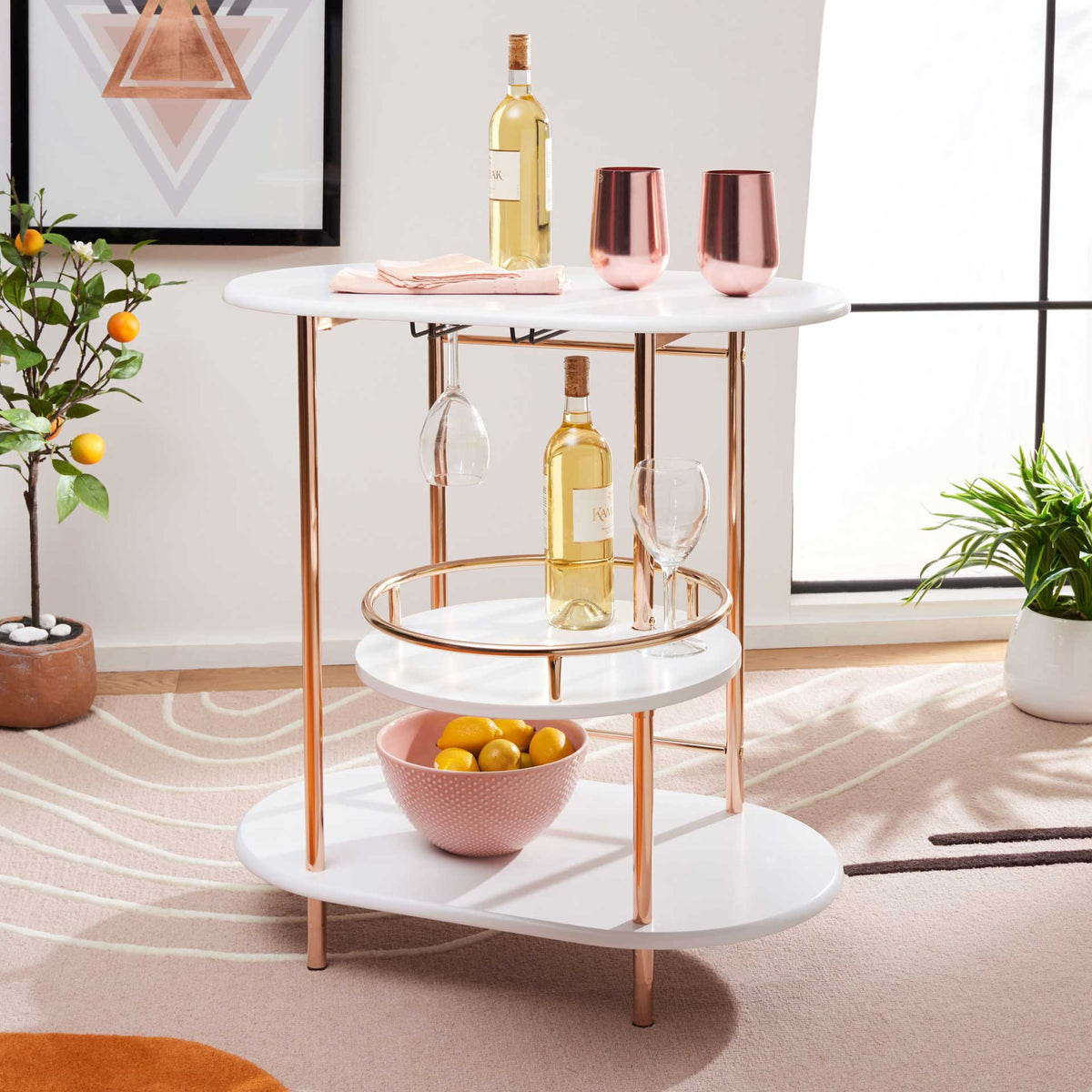 The pivoting white serving tray brings drinks forward beneath an oval tabletop with hanging stemware.