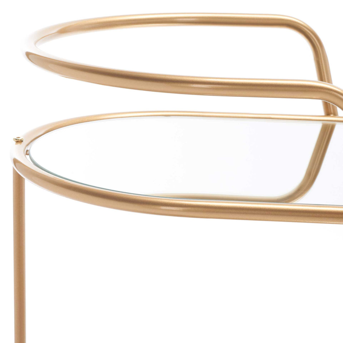 A mirrored upper shelf pairs smooth champagne gold trim with graceful curved rails.