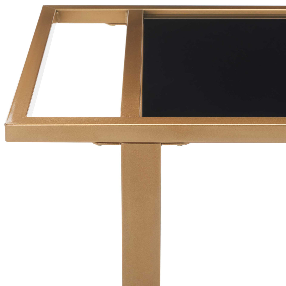 An open gold handle blends into the slim frame beside a glossy black glass top.