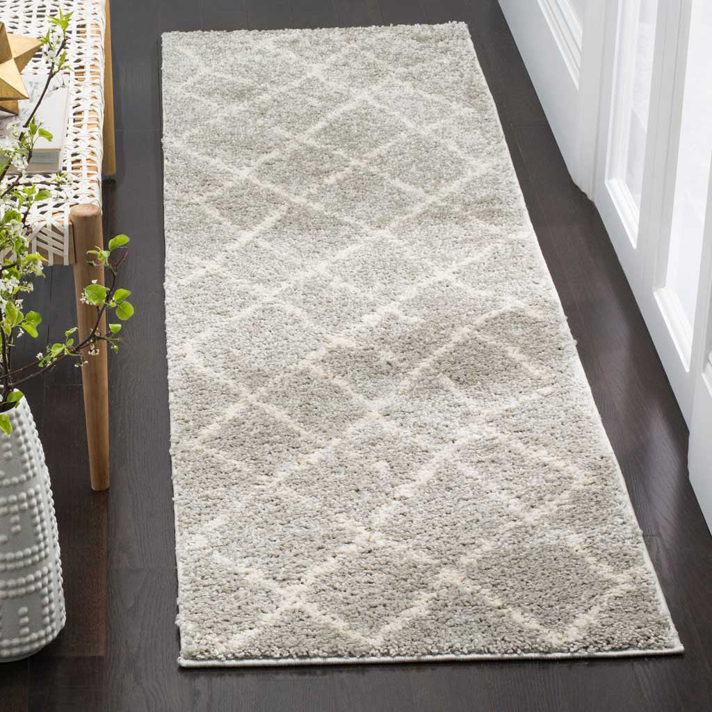 Soft light gray runner brings a cream lattice pattern and cozy texture to the hallway