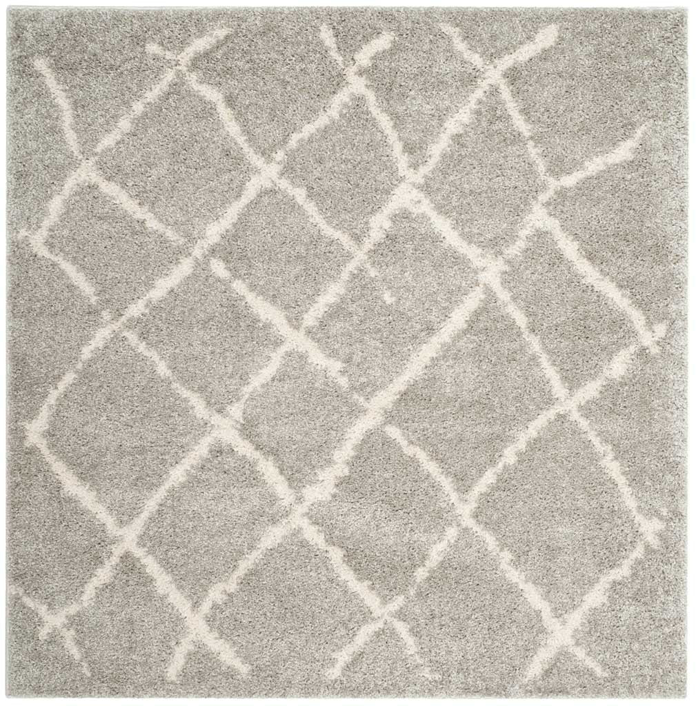 Square light gray shag rug with intersecting cream lines and a soft, thick pile