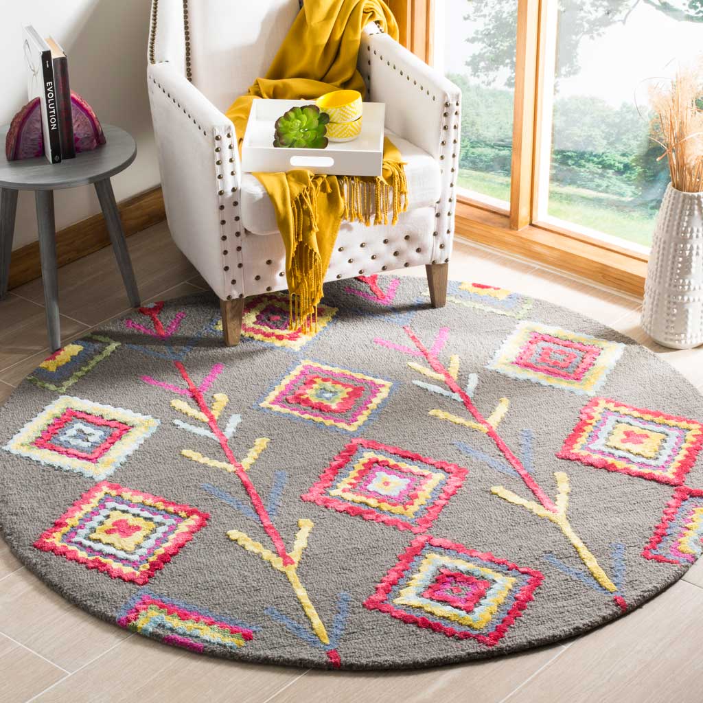 A round gray rug with playful multicolor diamonds brightens a cozy seating area