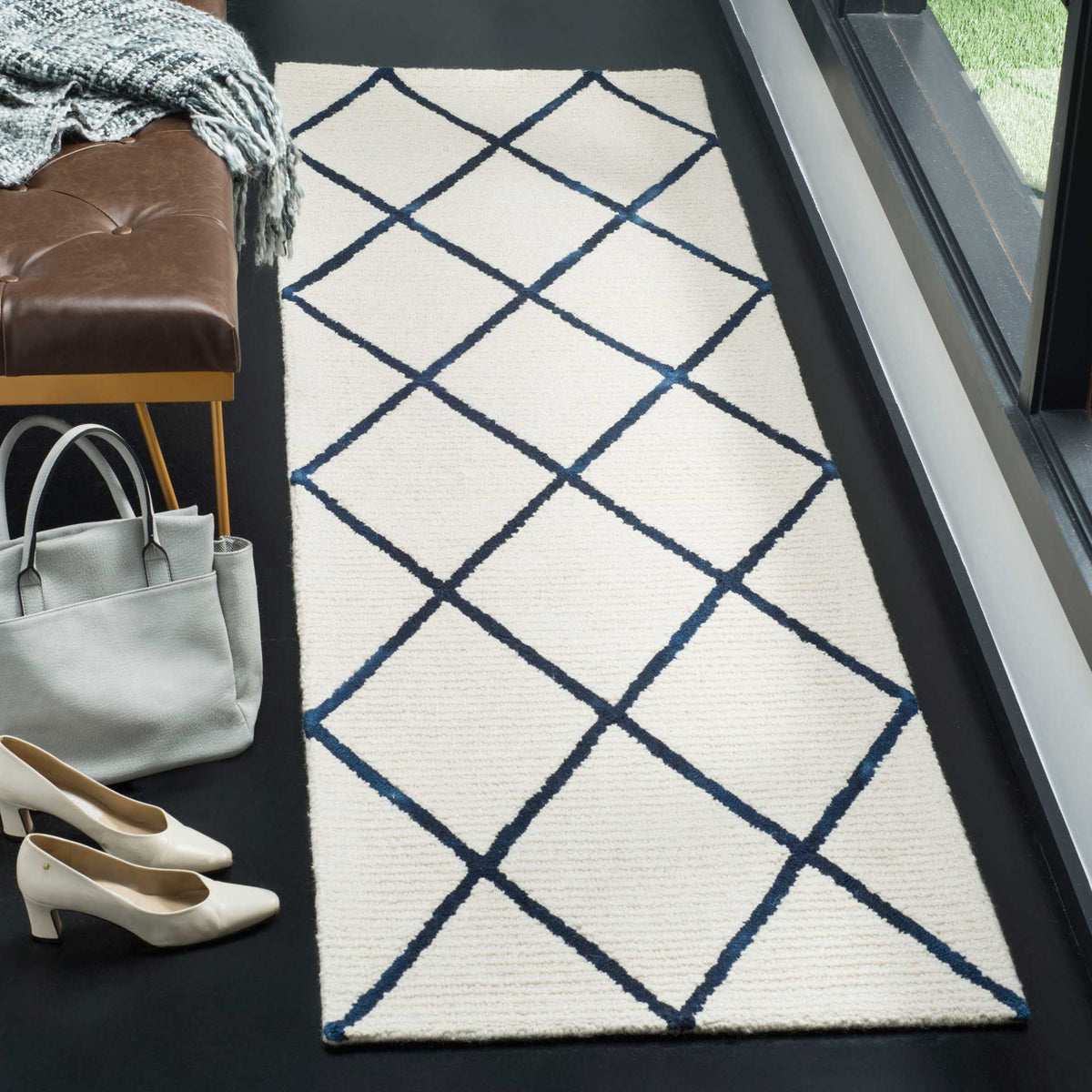 Plush ivory runner with navy crisscross lines and a bold geometric pattern