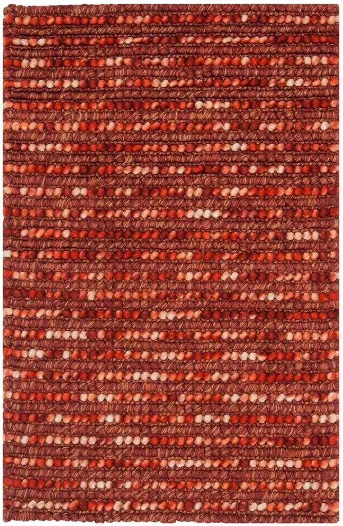 Thick rust-colored rows with creamy flecks give this accent rug a richly textured look