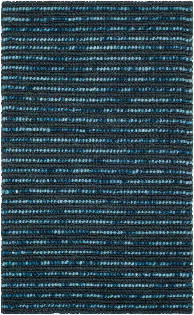 Raised stripes of navy and vivid blue create a textured, multitone woven rug