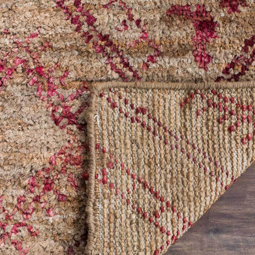 A folded corner reveals the woven backing beneath the rug's textured, red-accented surface.