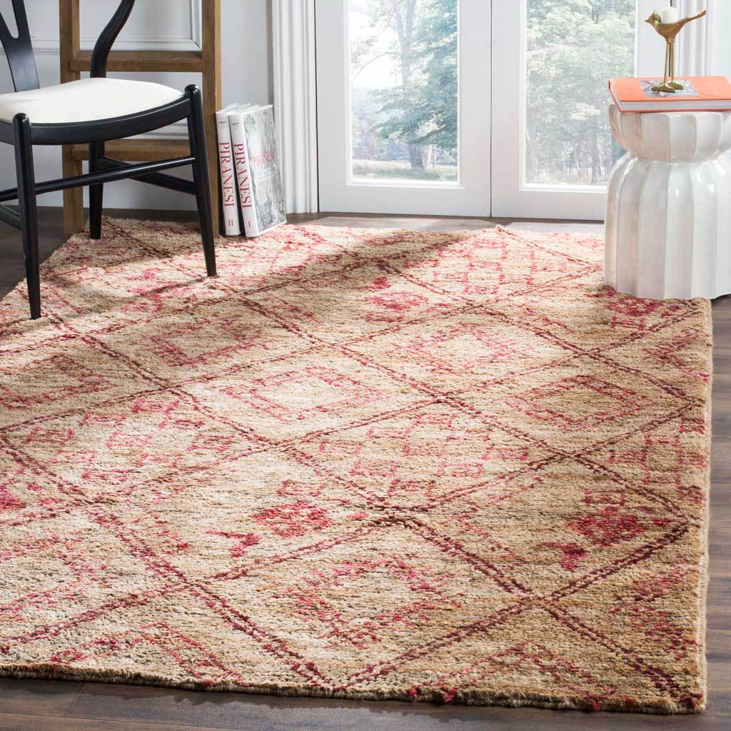 Warm natural tones and red geometric motifs bring earthy, hand-knotted texture to a bright room.