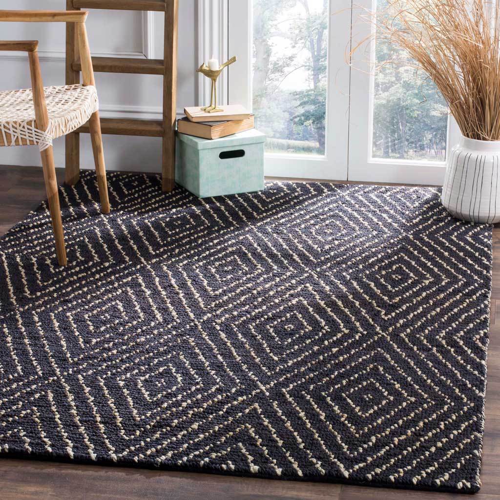 Black and ivory diamond motifs add graphic warmth and woven texture to the room