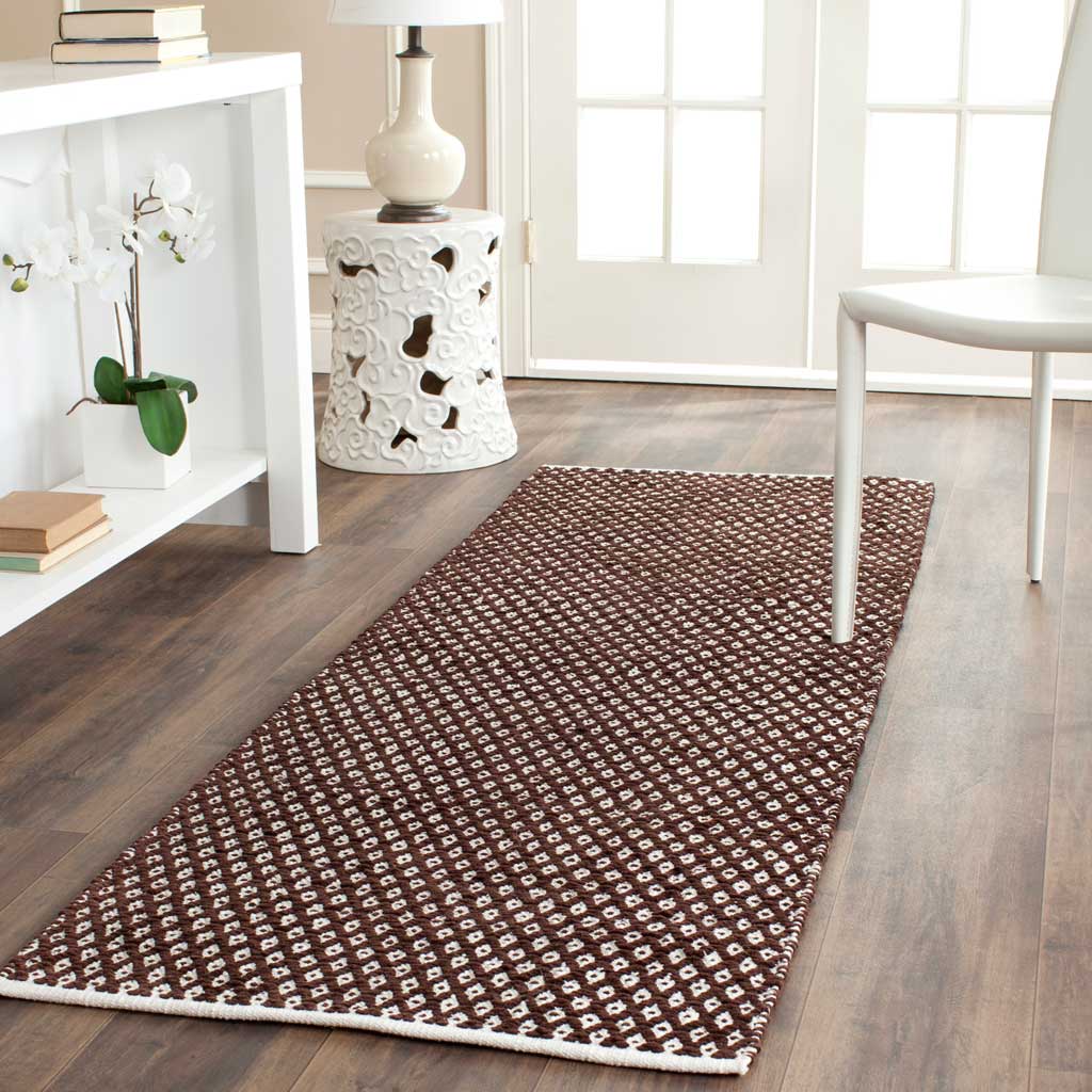 Brown and cream diamonds bring warmth and pattern to this cotton runner
