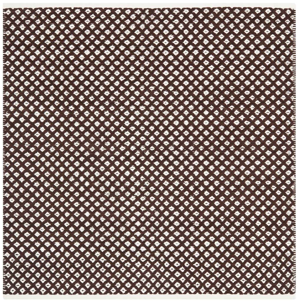 This square cotton rug layers ivory geometric diamonds over a rich brown ground.