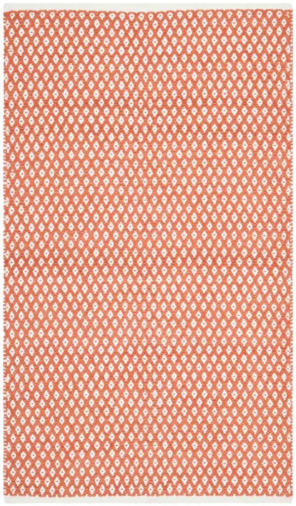 A compact 3 x 5 ft cotton rug pairs energetic orange with delicate ivory diamonds.