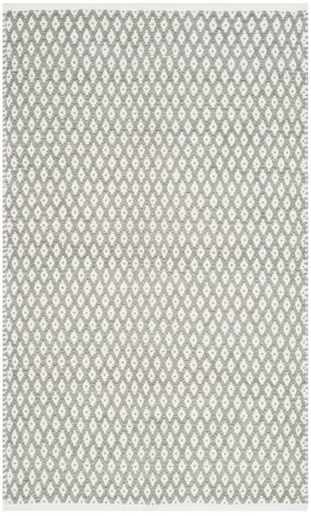 A compact gray accent rug offers close-set ivory diamonds and pale finished edges.