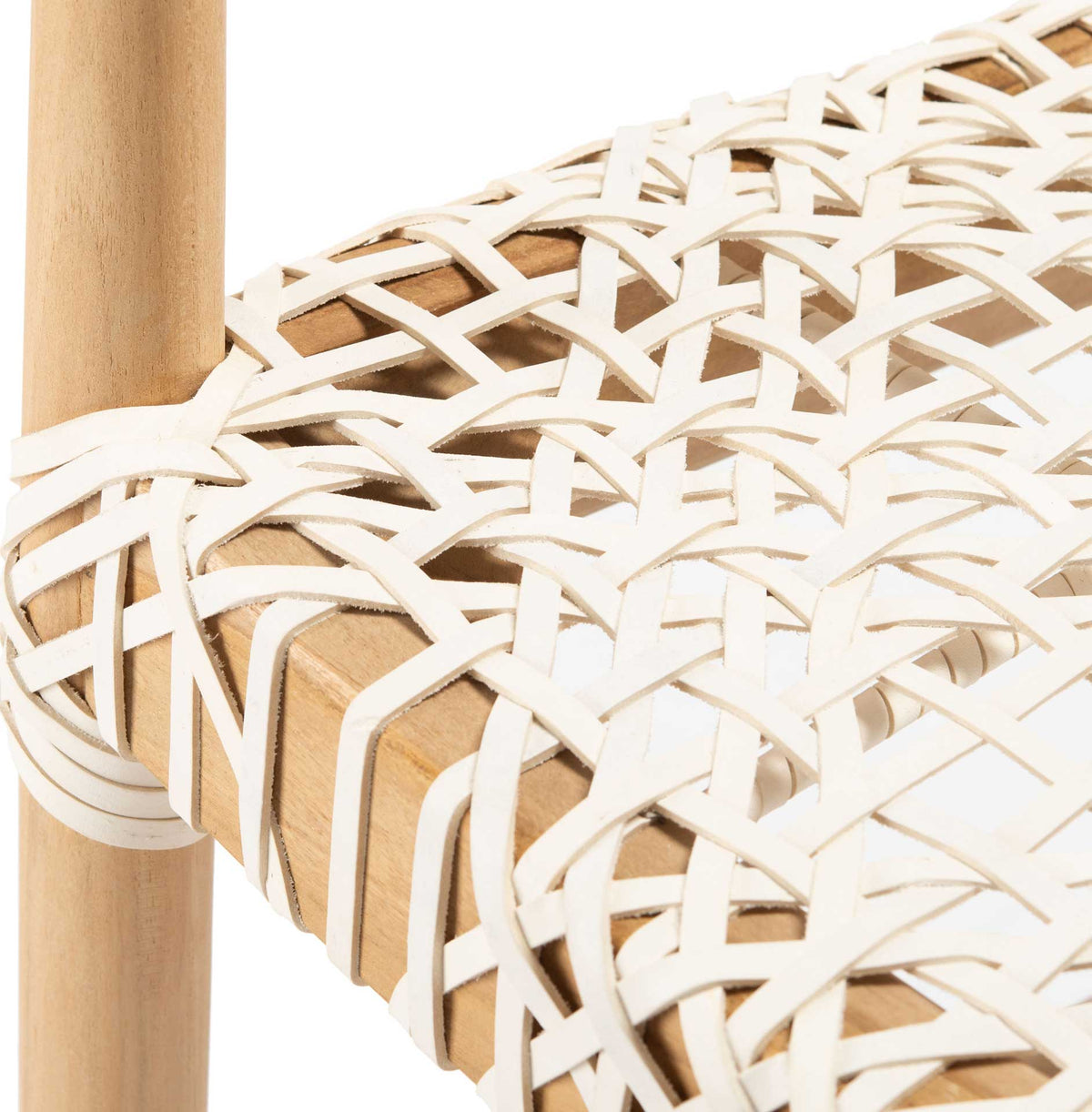 Interlaced white leather strips wrap the teak seat frame in a geometric lattice