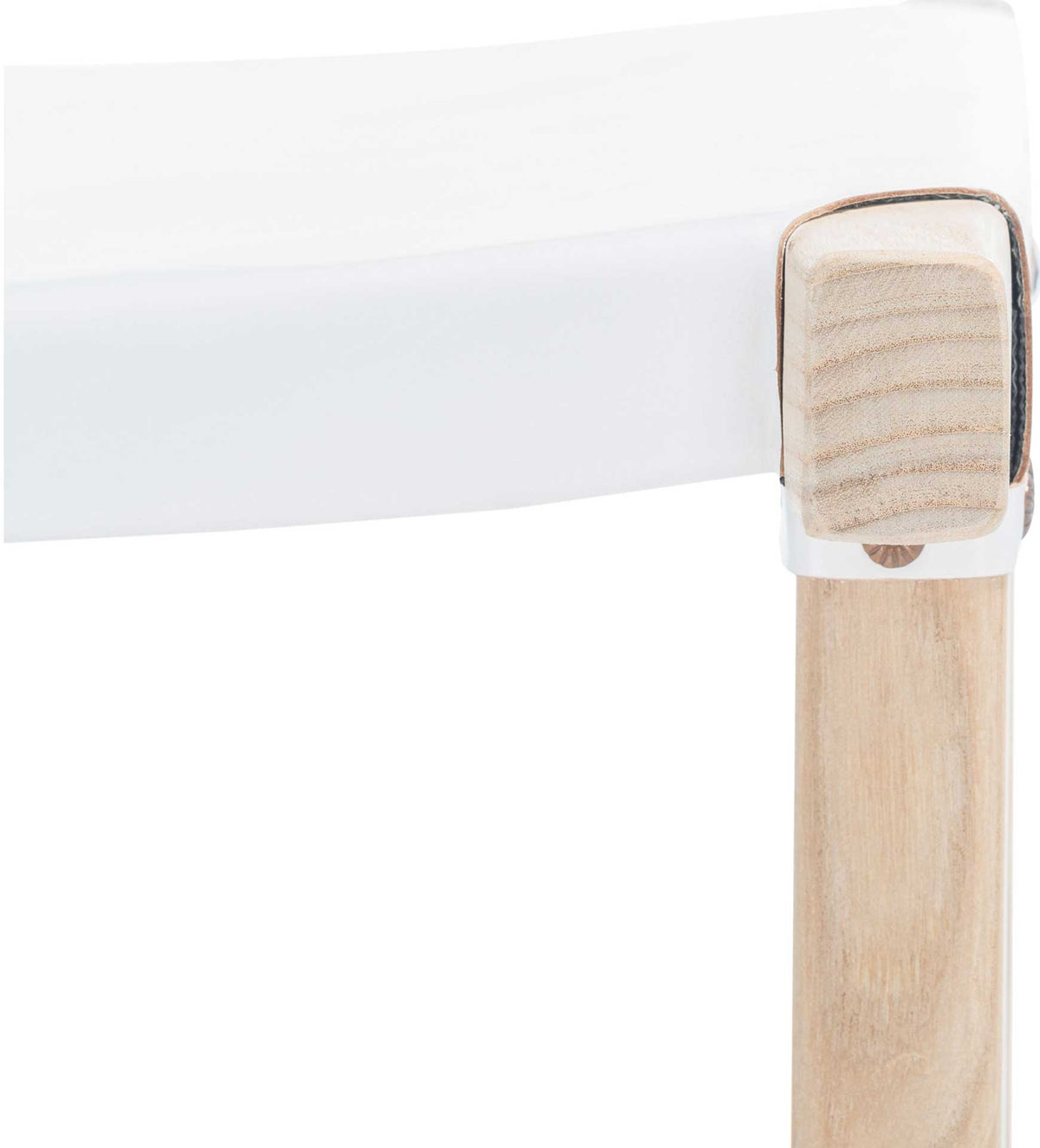 A crisp white leather seat meets an exposed light wood corner with visible fastening