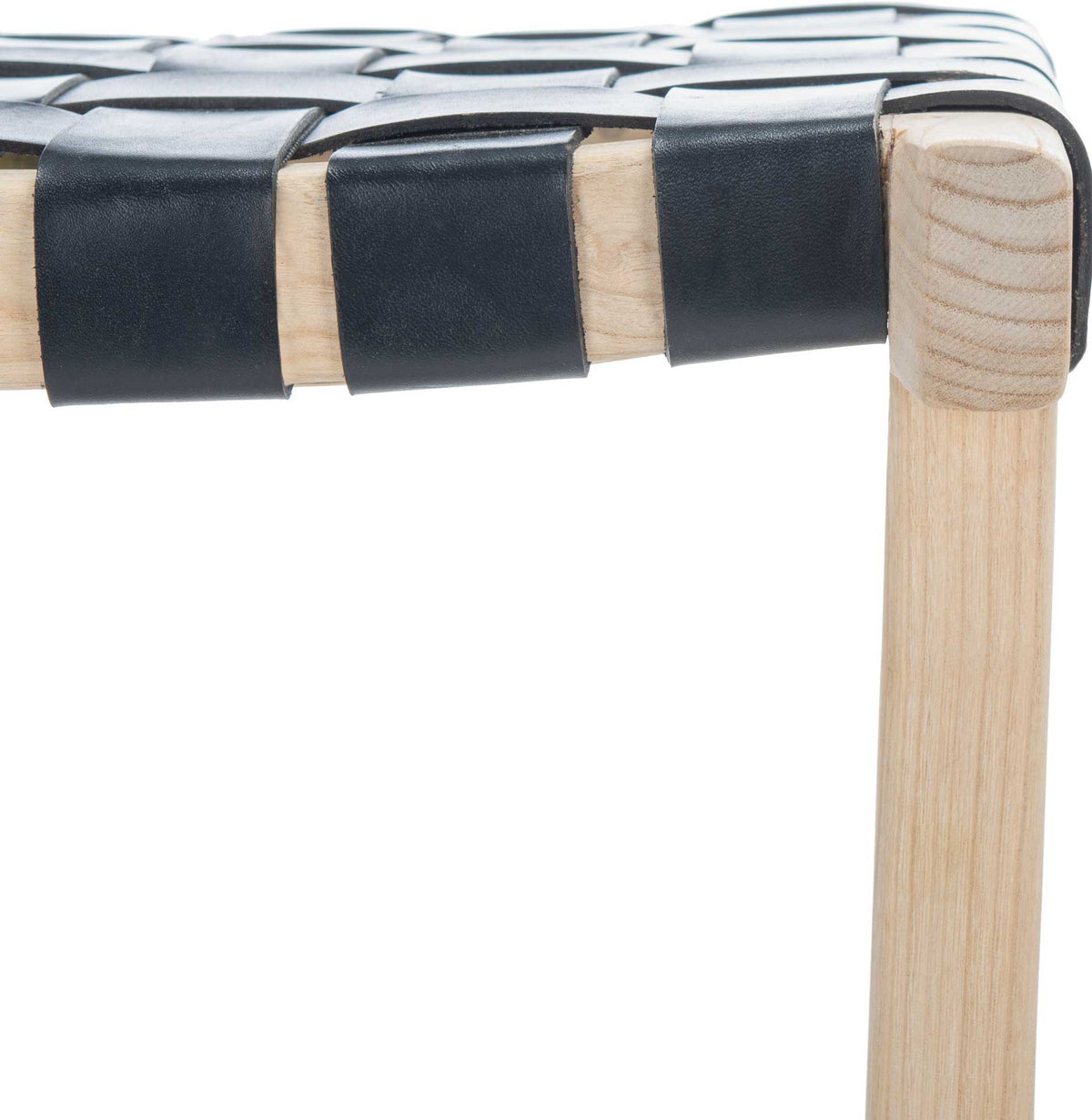 Broad black leather strips wrap over a pale wood seat rail, highlighting the woven texture
