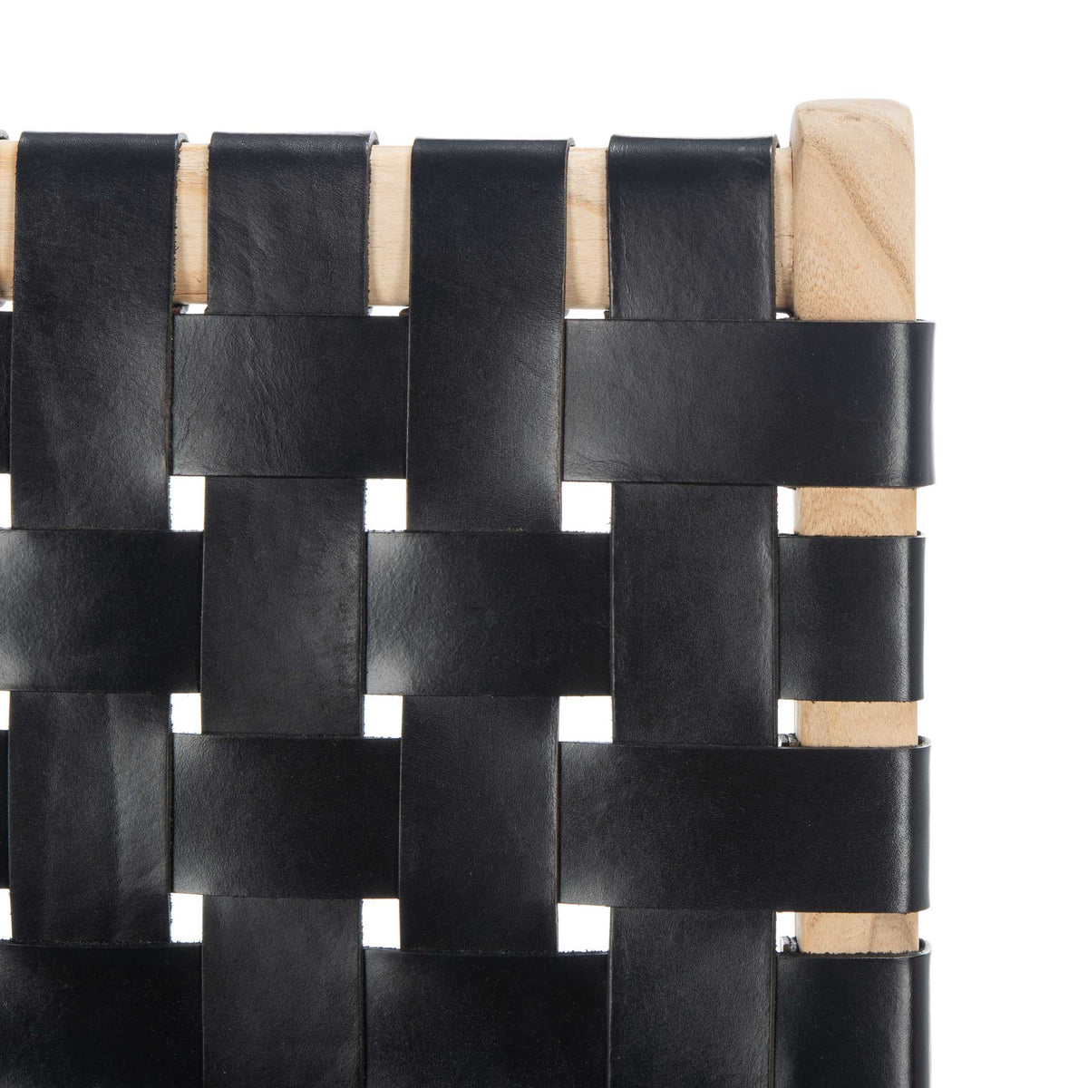 Supple black leather strips cross neatly over a light natural wood backrest.