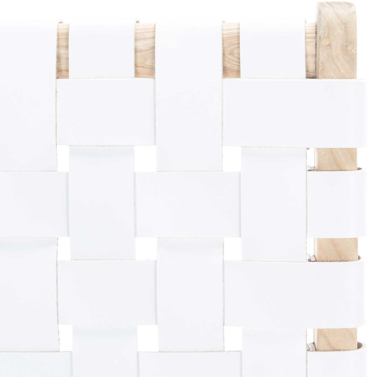 Interlaced white leather straps create a bright basket weave against pale wood grain.