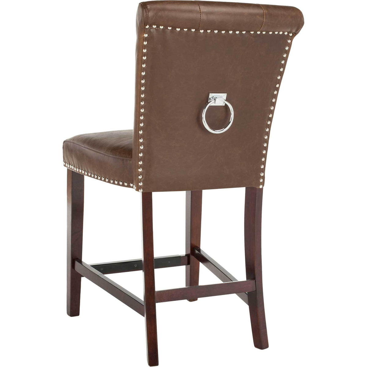 Chrome nailheads frame a curved brown faux leather back with a bright metal ring and dark wood frame.