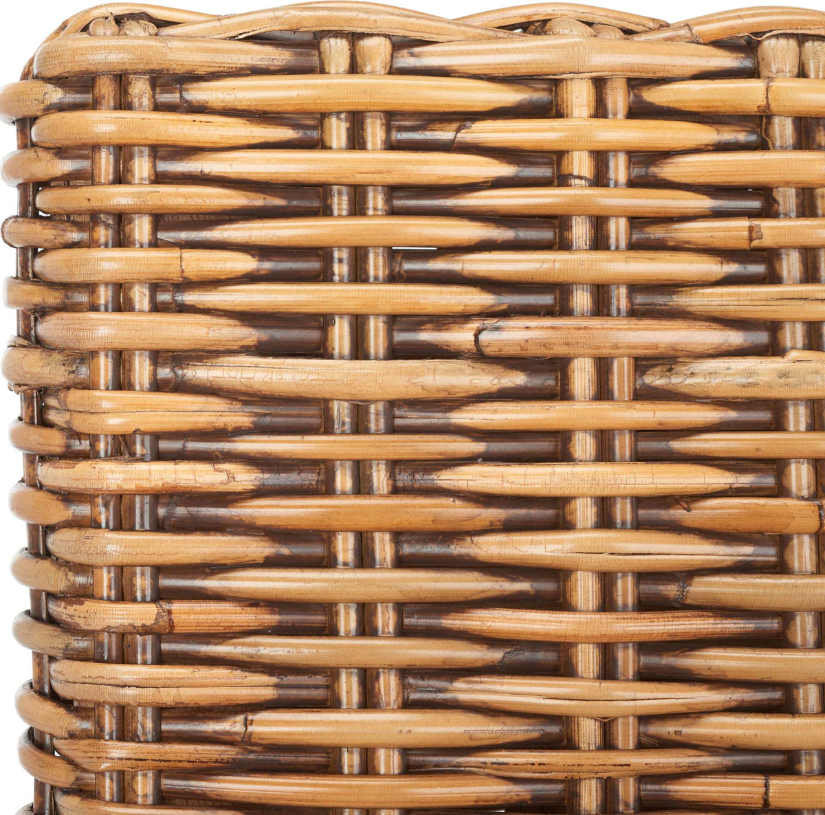 Varied amber rattan strands interlace for a warm, richly textured wicker surface