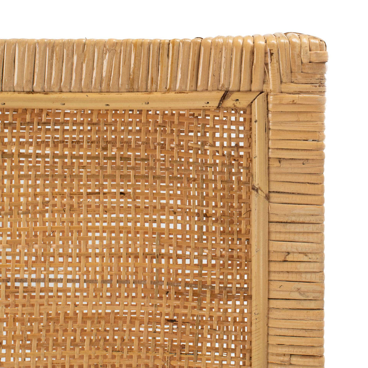 Fine cane lattice and wrapped frame give the counter stool warm, handcrafted texture