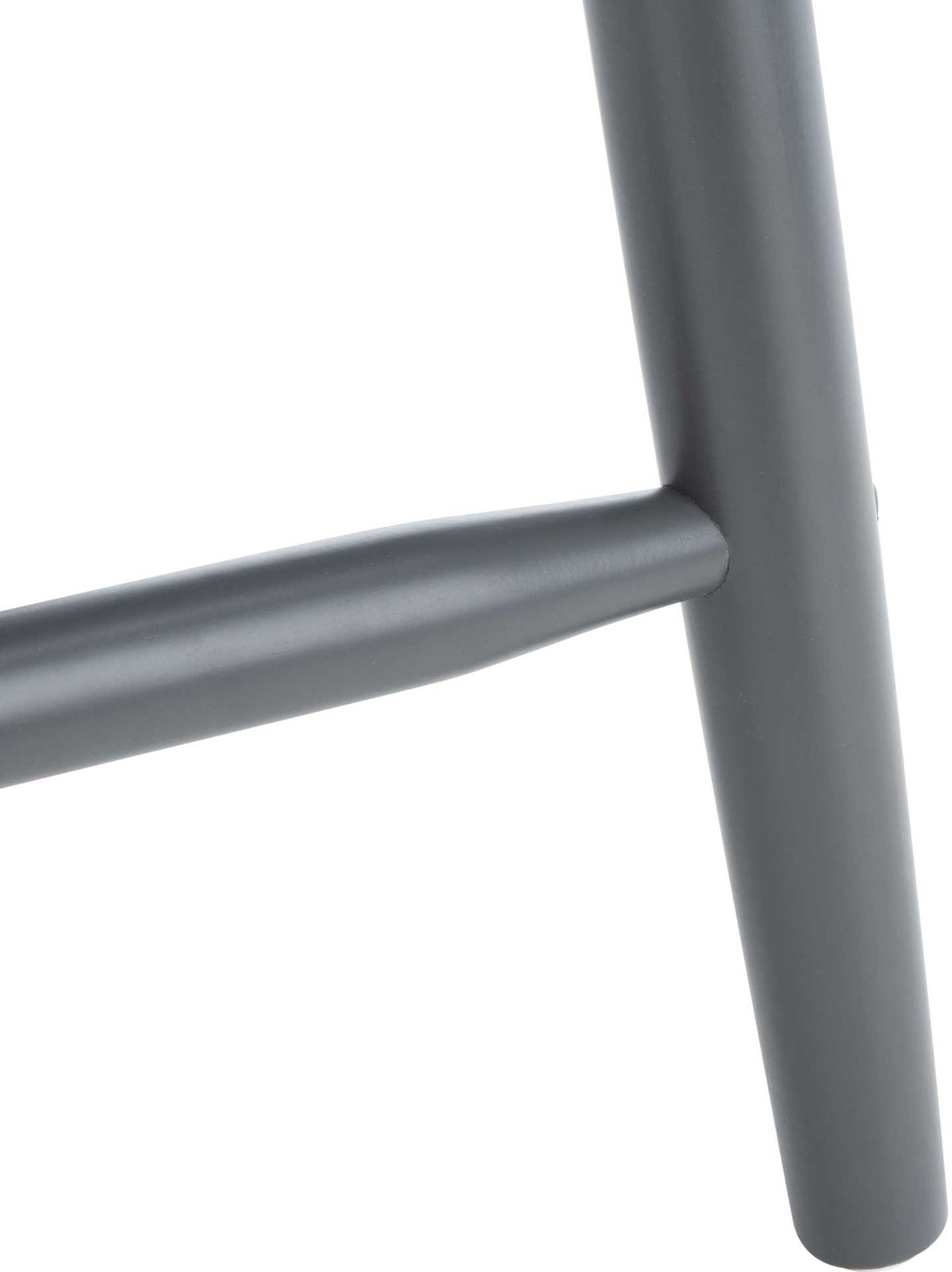 A smooth gray wood leg meets a rounded footrest rung for a clean, sturdy junction.
