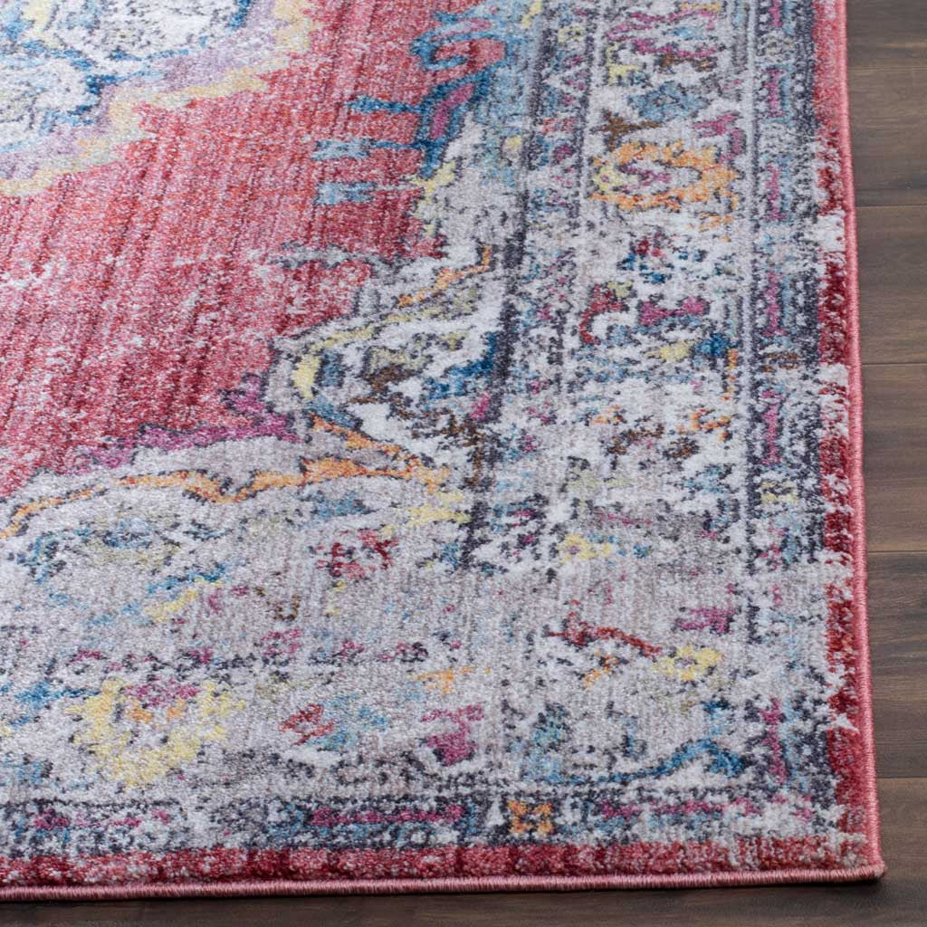 A neatly bound edge frames textured floral details in rose, blue, and light gray