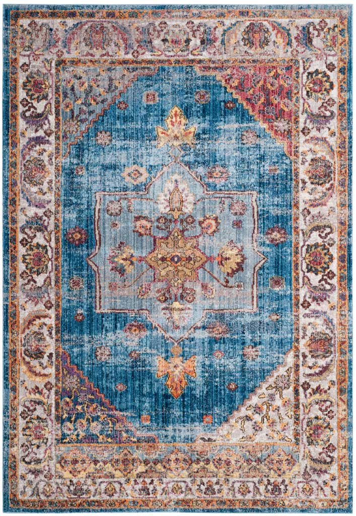 Softly distressed blue and ivory hues highlight a classic medallion and richly detailed floral border.