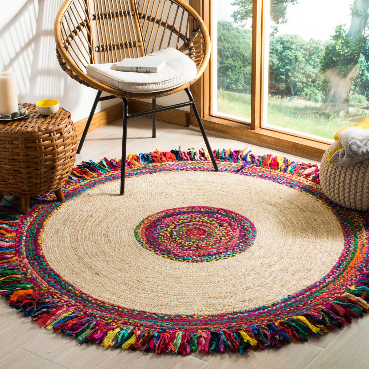 Vibrant woven rings and fringe surround a calm jute field on this round rug.
