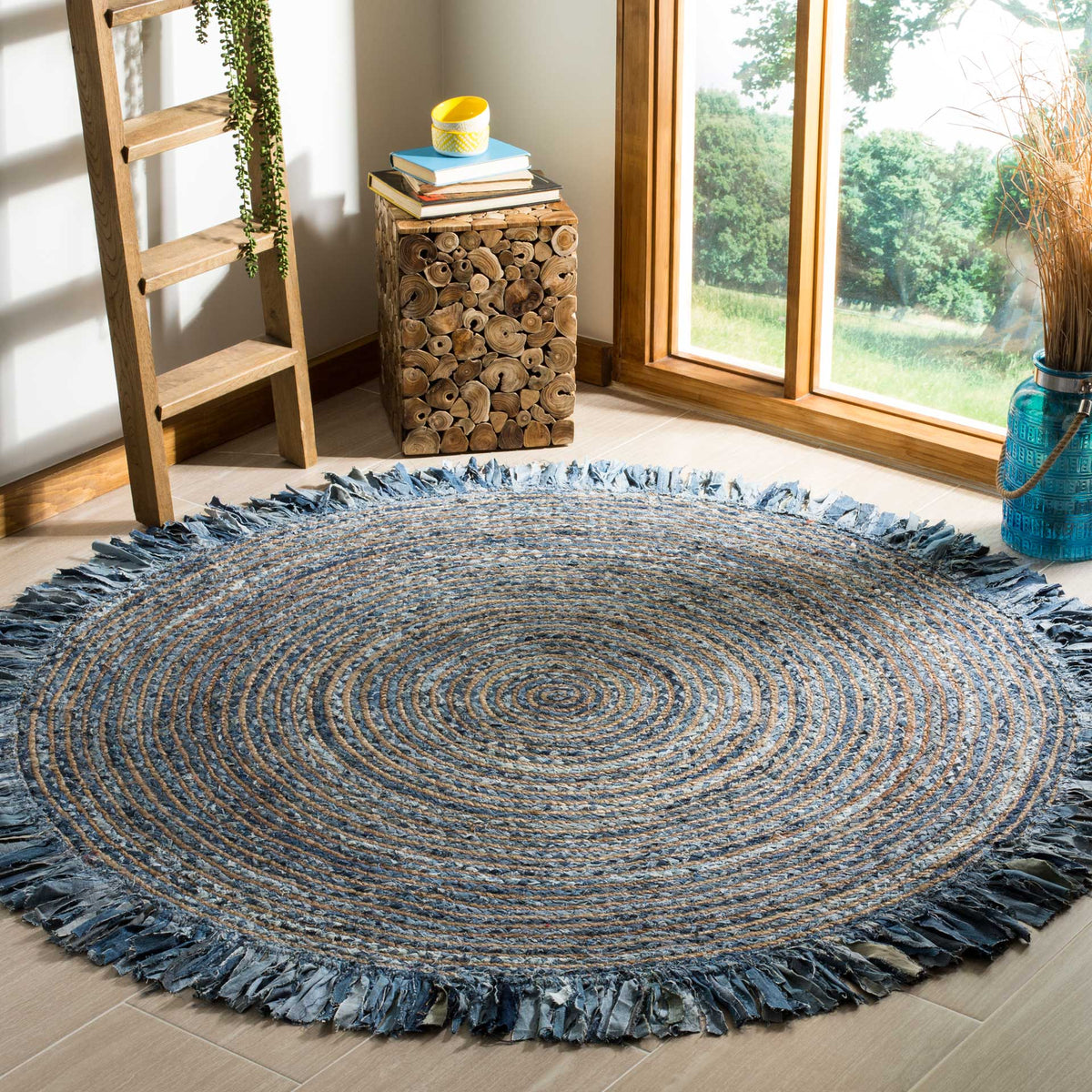 Denim-blue spirals and a soft fabric fringe ground this airy living space.