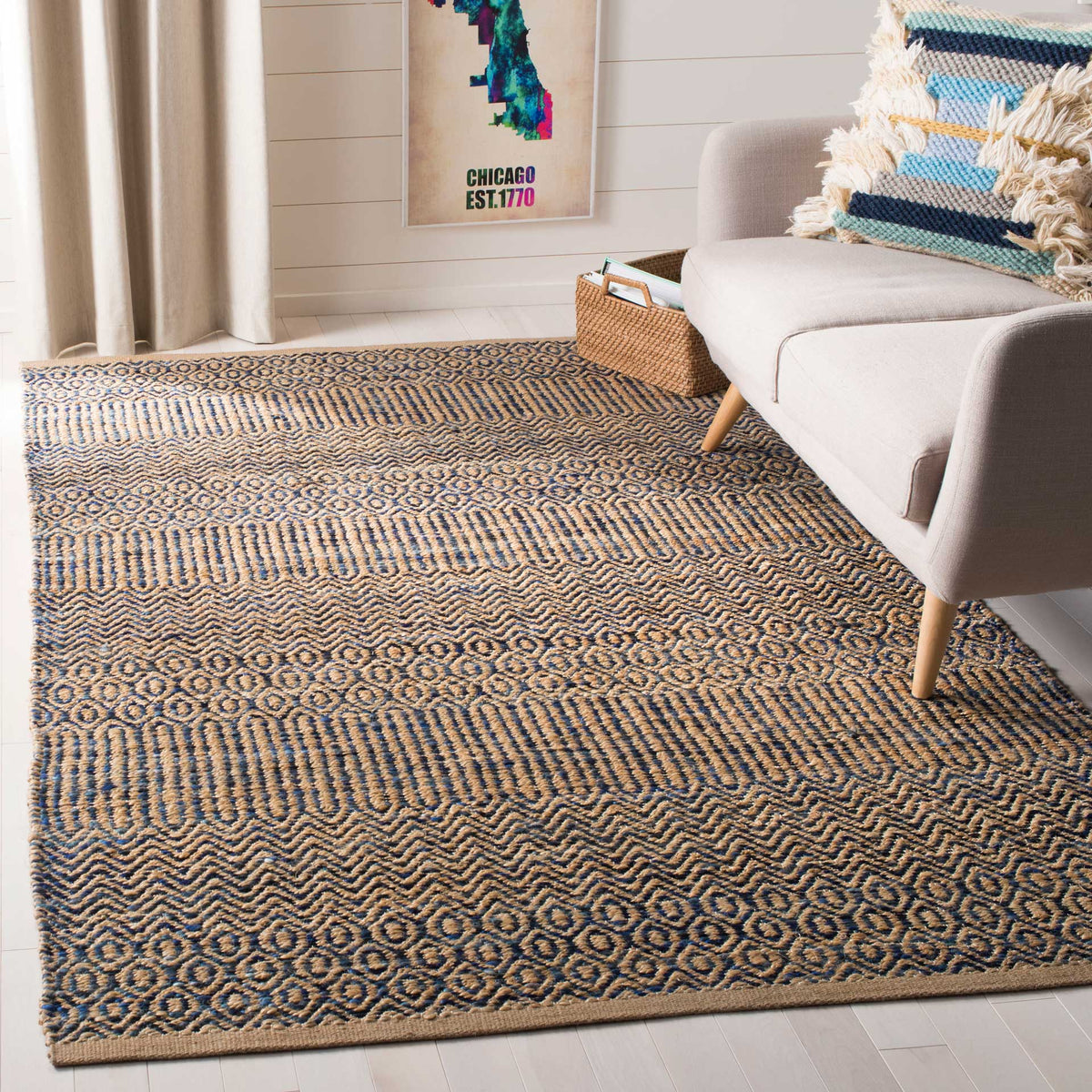 Navy and natural bands bring graphic rhythm beneath neutral seating