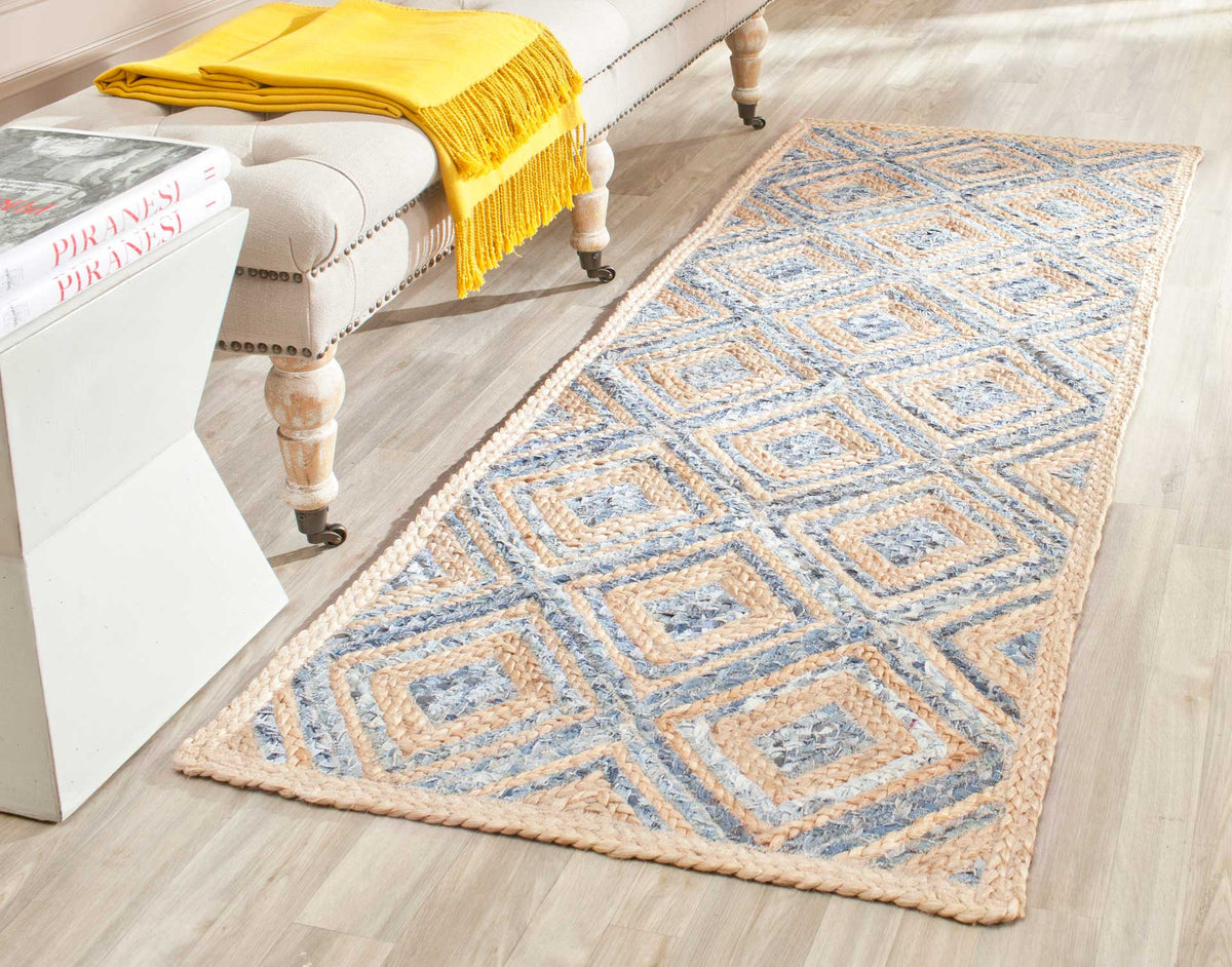 Bold blue diamond patterns brighten this textured natural-fiber runner