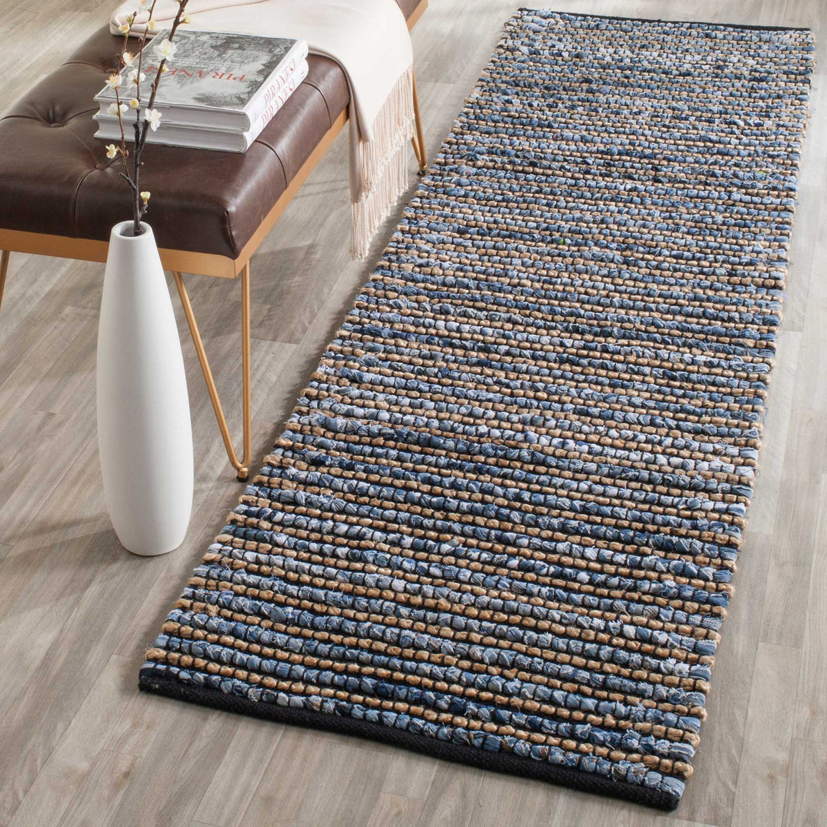 Textured blue and natural stripes lend a relaxed feel to this thick woven runner