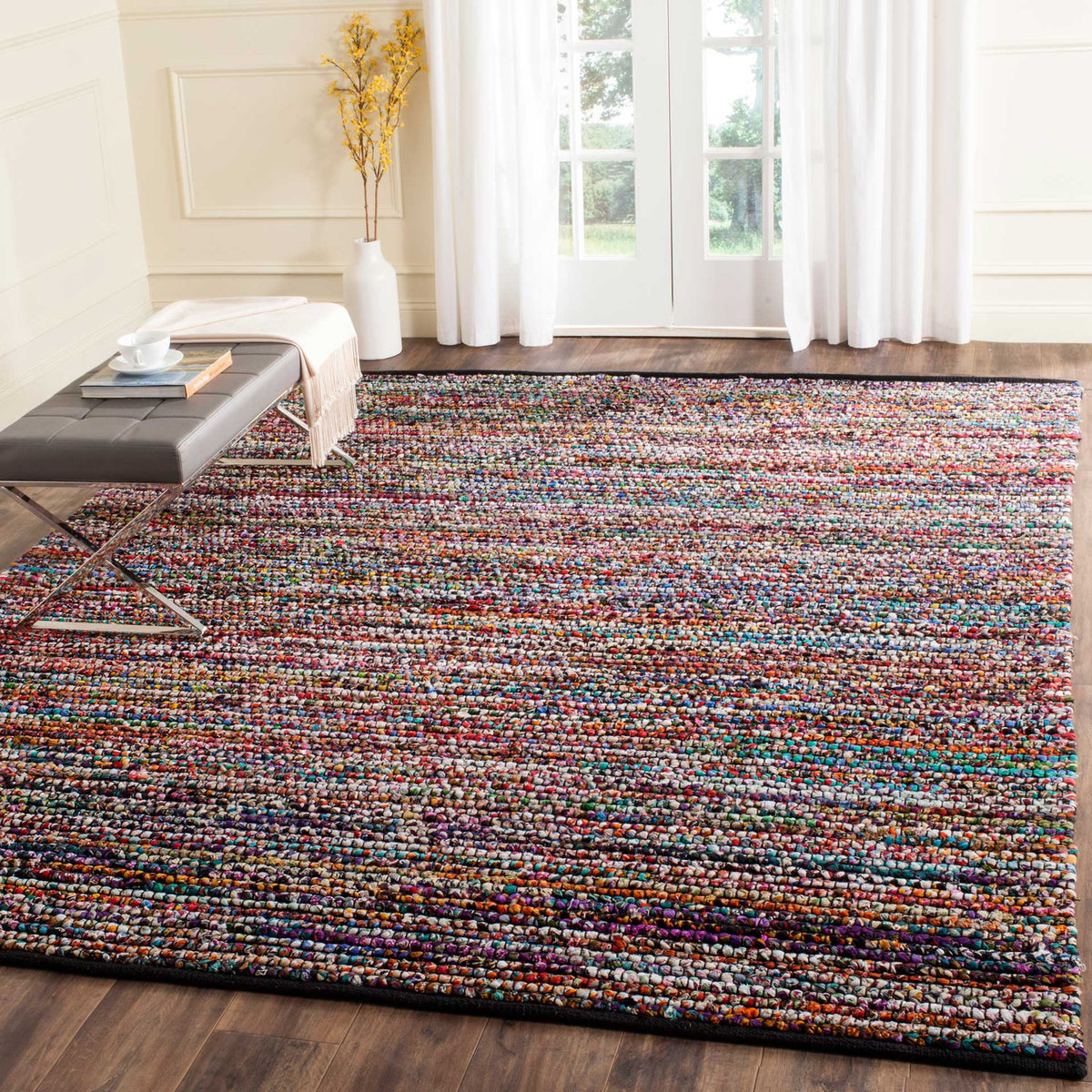 Vibrant stripes bring energy and texture to a spacious seating area