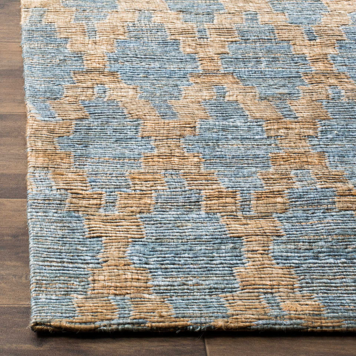 Pale blue shapes and textured gold lines form a raised geometric weave