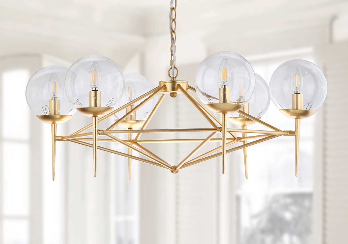 Clear glass globes crown a six-light chandelier with airy, angular gold leaf metalwork.