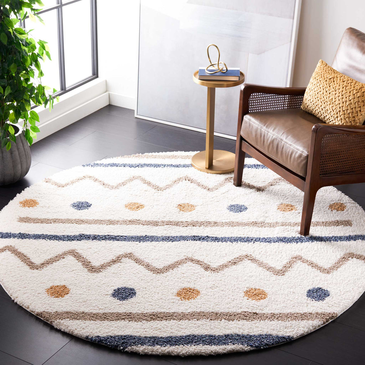 Playful zigzags and multicolored dots add warmth to a plush round rug
