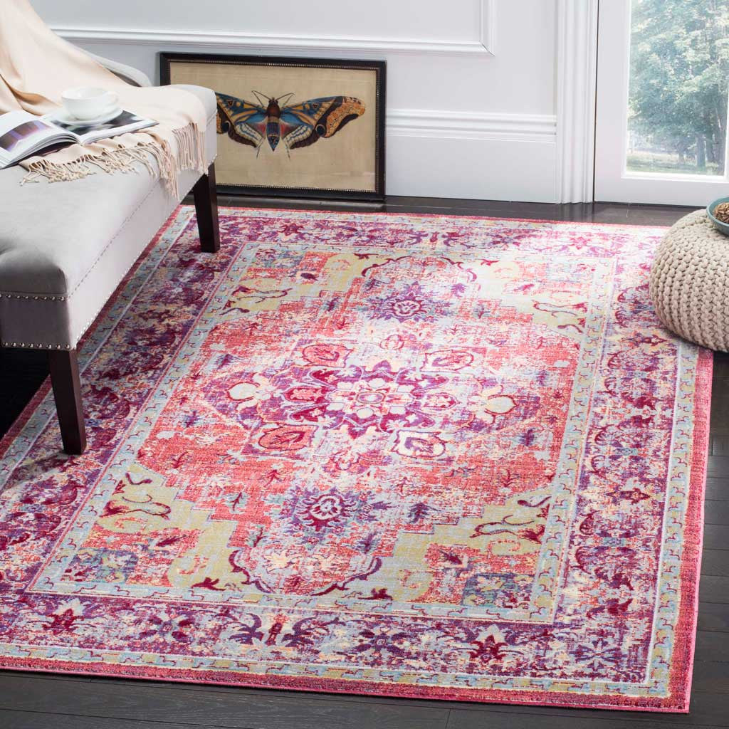 Purple and coral floral medallion rug brightens a living room with vintage-inspired color