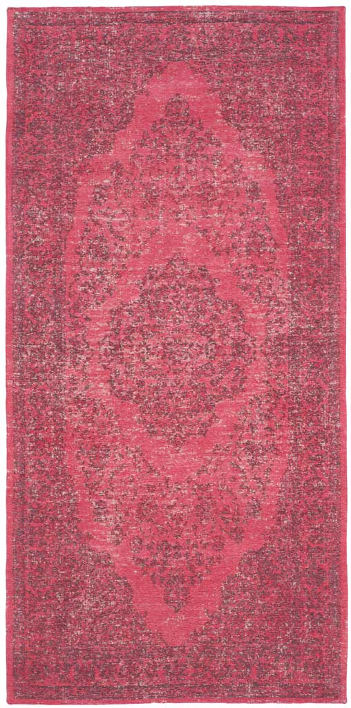 Fuchsia accent rug spotlights a bold central medallion surrounded by richly distressed florals.