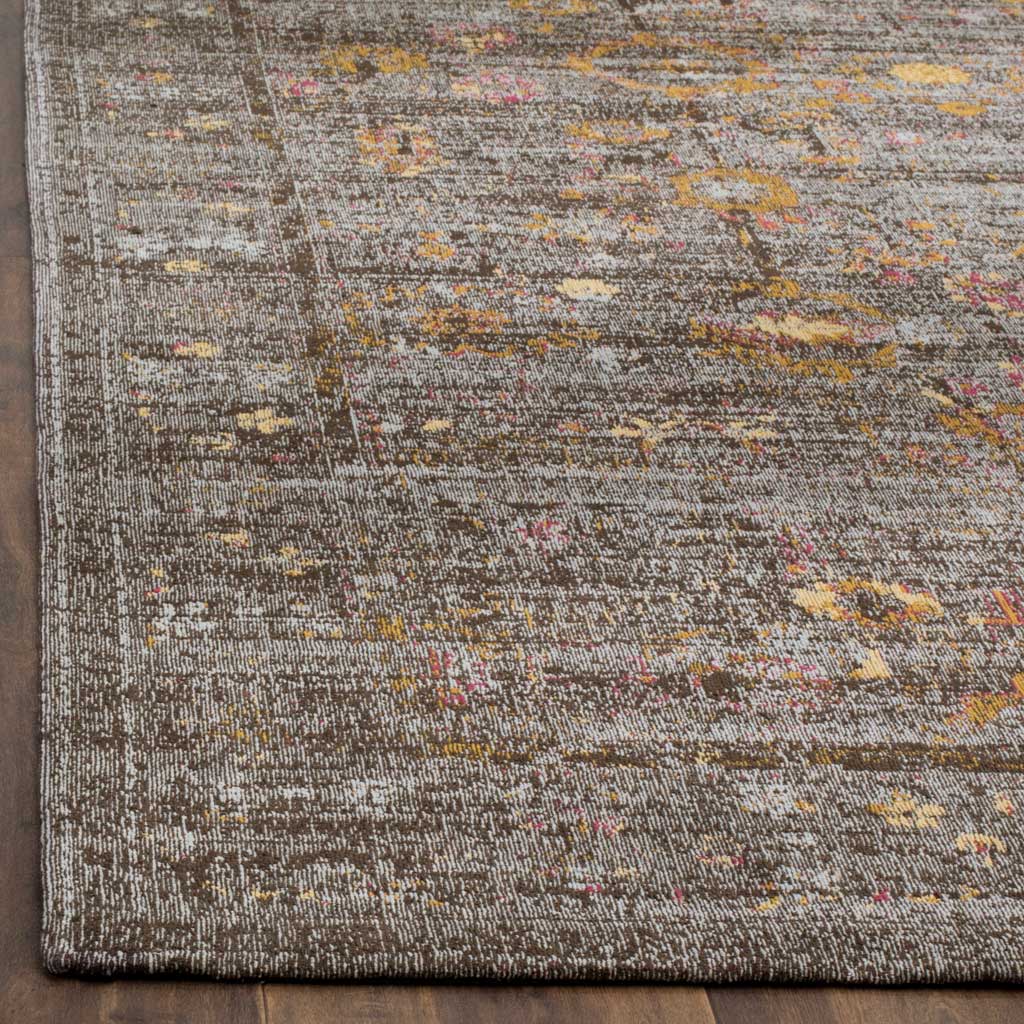 Gold and rosy flecks add warmth to the textured charcoal ground and crisp bound edge.