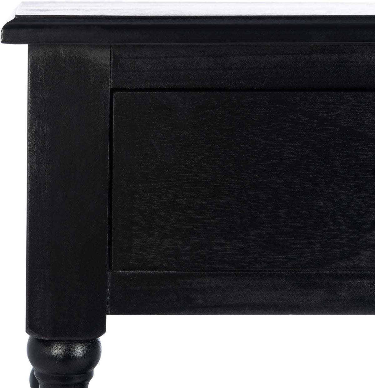 Black wood grain accents the framed drawer front and gently overhanging tabletop.
