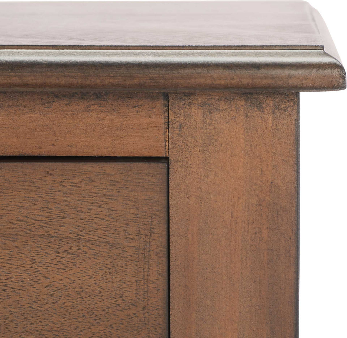 Warm brown wood grain accents the framed drawer front and gently beveled tabletop.