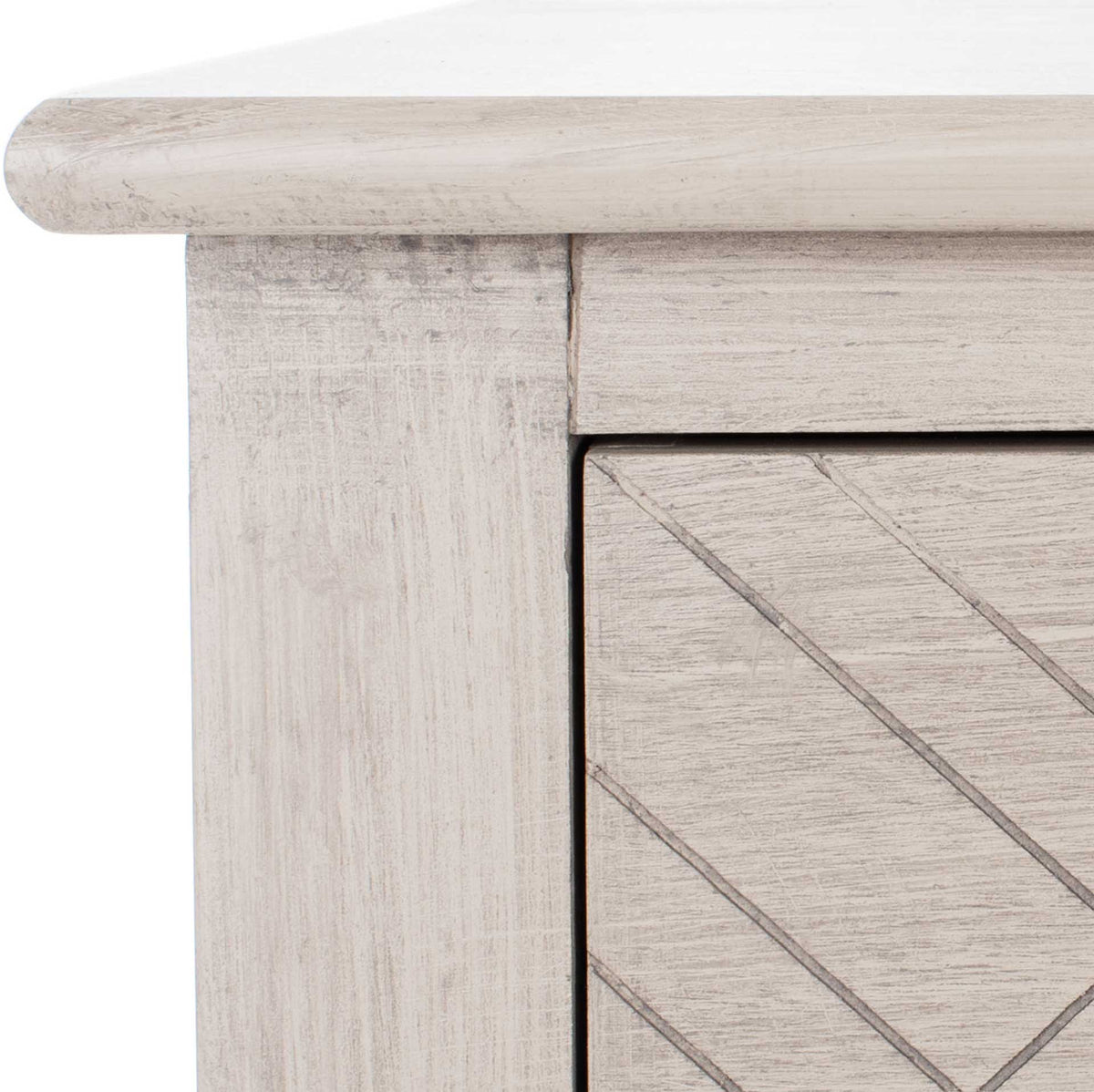 Weathered greige wood grain and carved diagonal lines accent the console's rounded tabletop edge