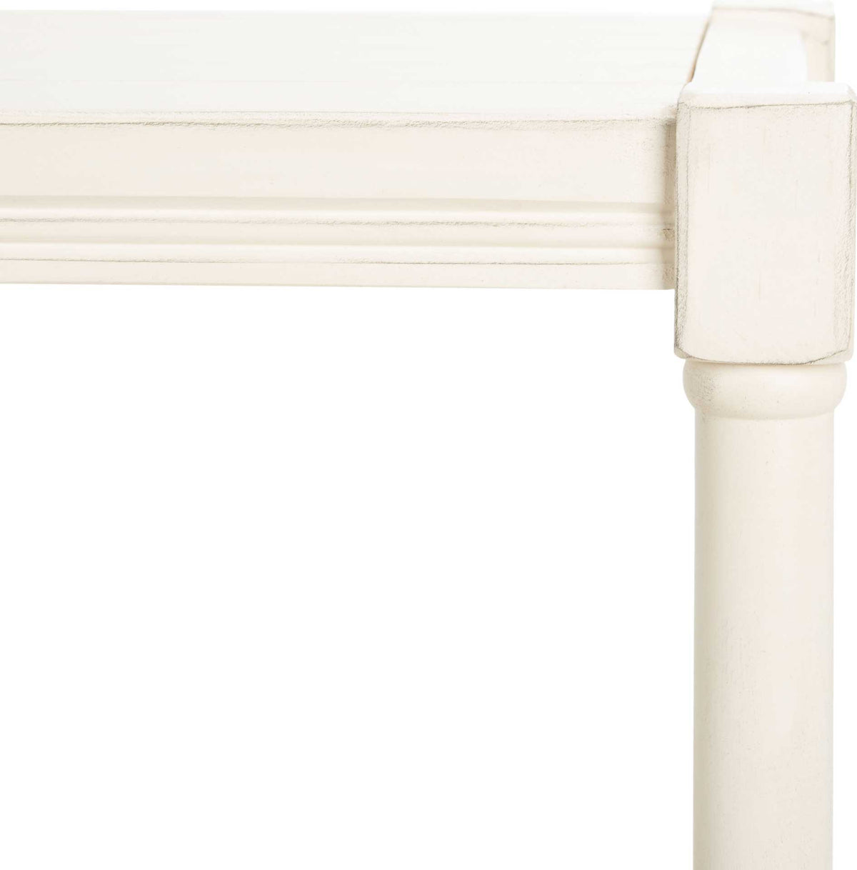 Soft distressing highlights the white top rail, square corner, and turned post.