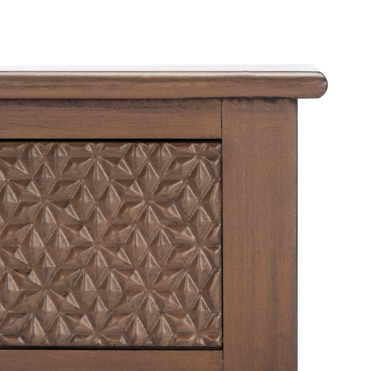 A brown wood finish highlights the raised geometric pattern beneath the tabletop's rounded edge.