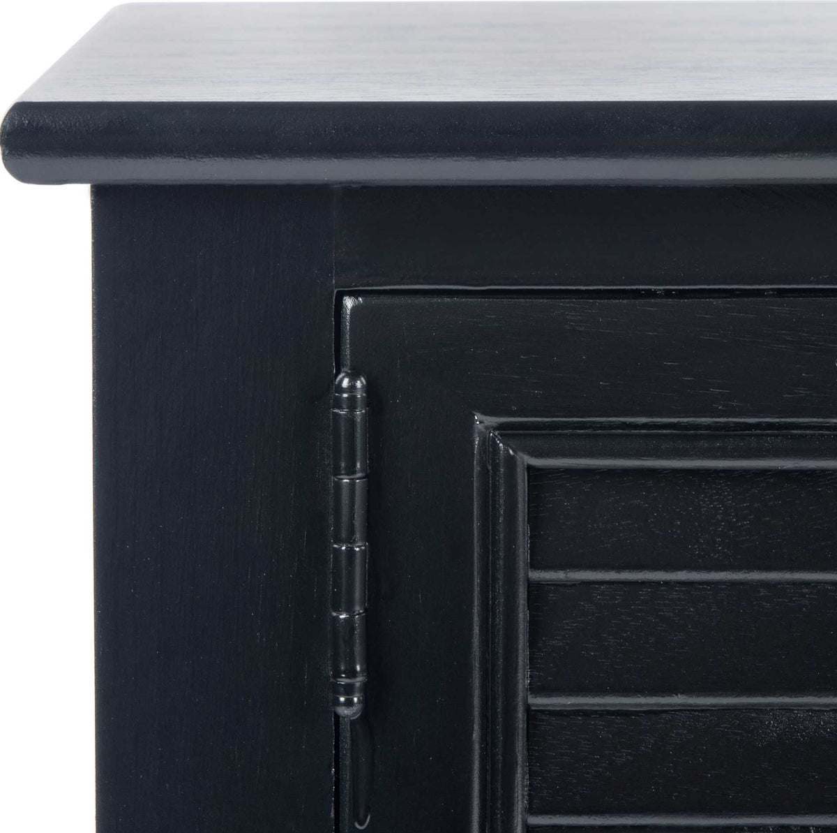 Subtle wood grain and a decorative hinge accent the black cabinet door beneath the rounded top.