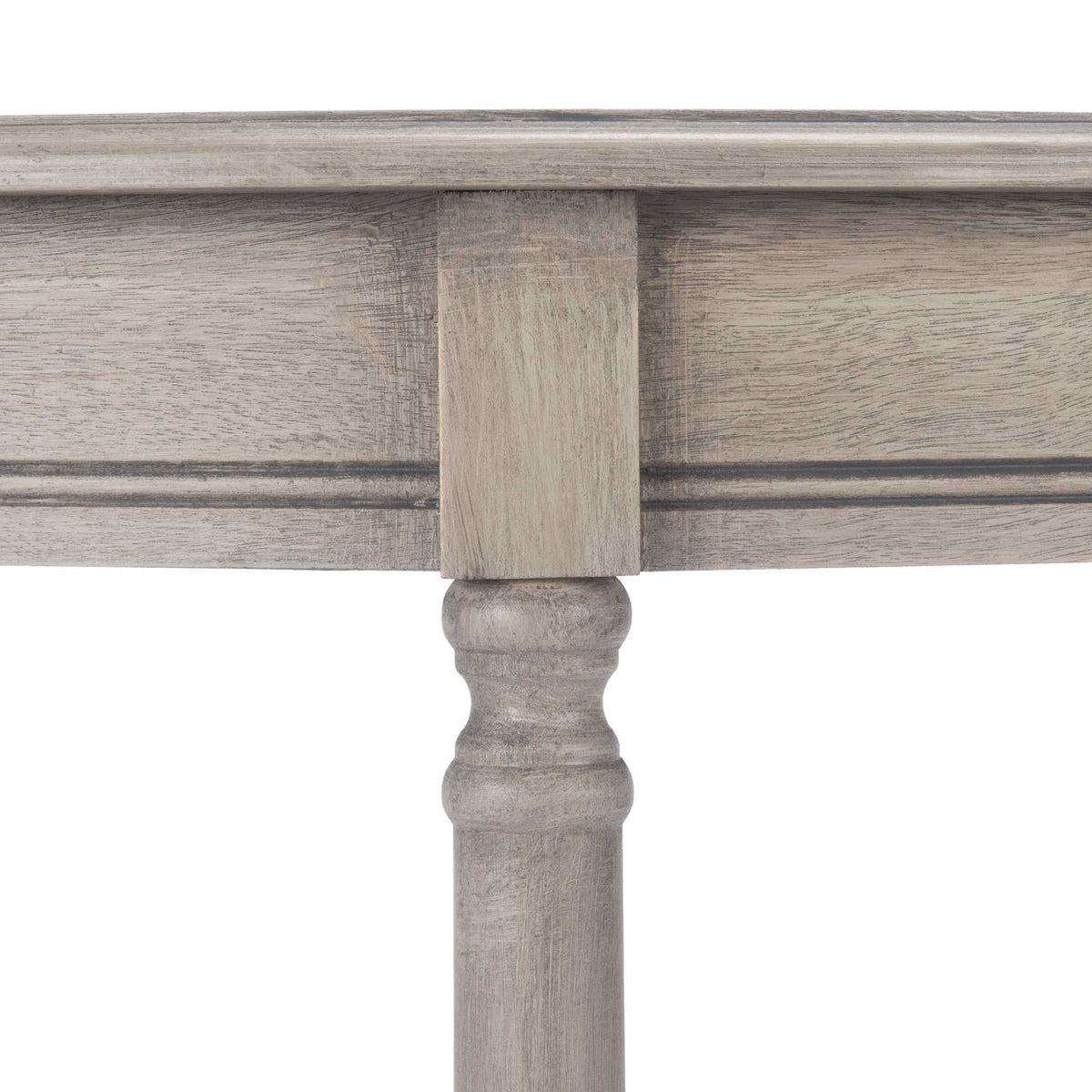 A delicately turned leg adds classic character to the pale greige wood frame.