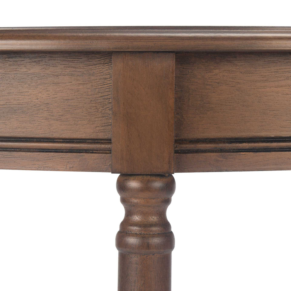 A classic turned brown leg accents the console's molded, half-round apron.