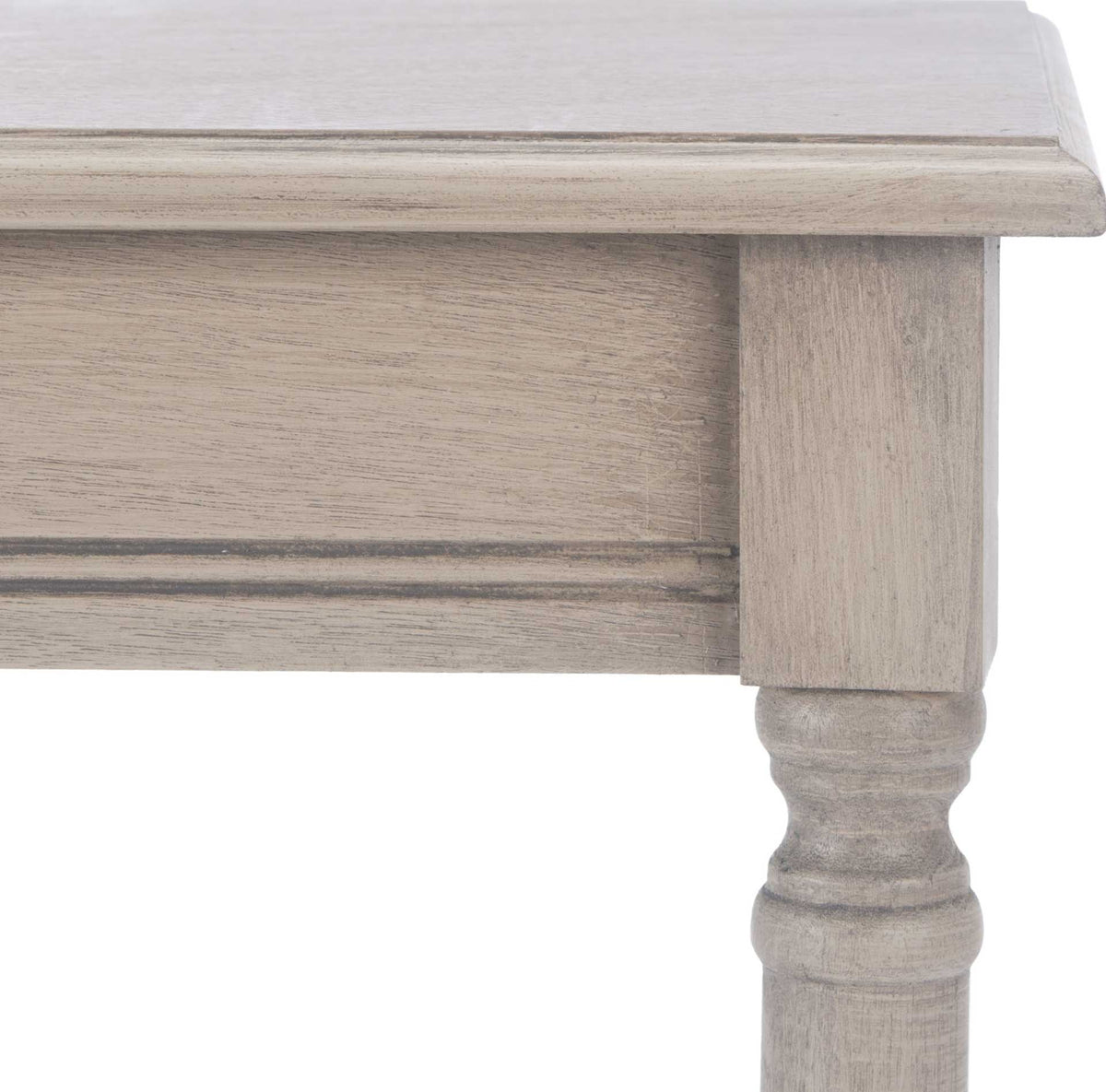 Light greige wood grain, a molded apron, and a carved leg lend traditional detail.
